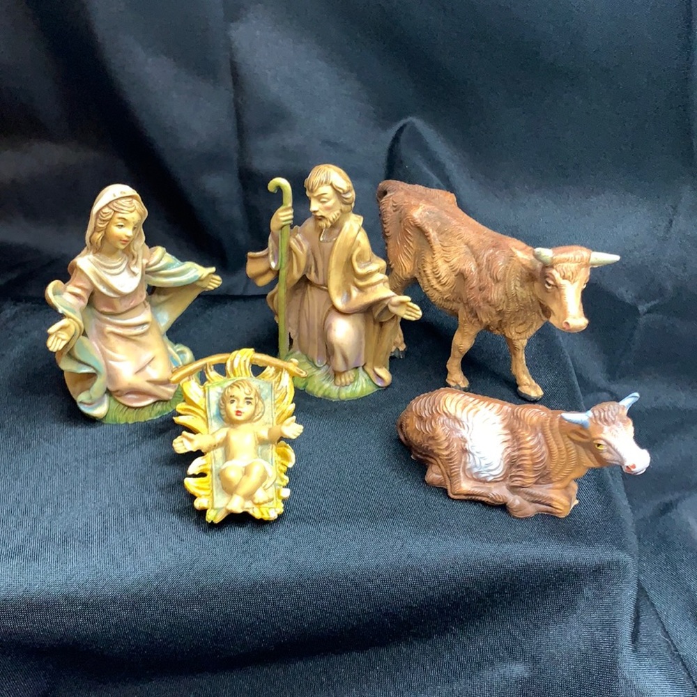 Italian nativity pieces…Mary, Joseph, Baby Jesus and 2 cows